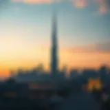Stunning view of Al Mulla Tower against the sunset skyline of Dubai