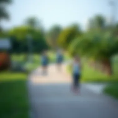 Joggers on a path surrounded by greenery in Mashreq Park